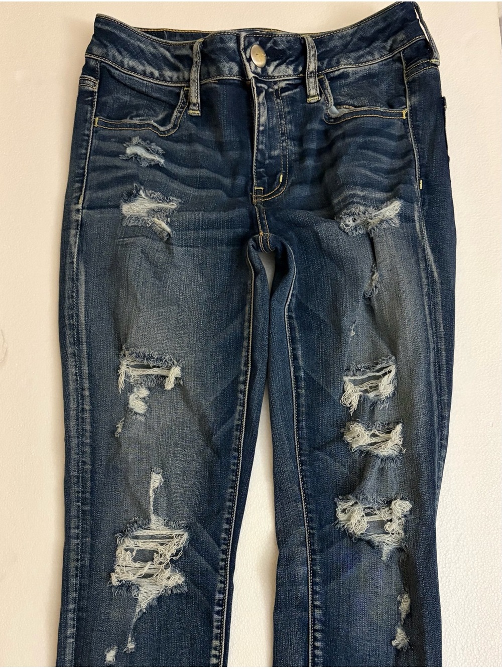 American Eagle Women's Distressed Skinny Jeans in Dark Blue
